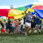 adults playing parachute games